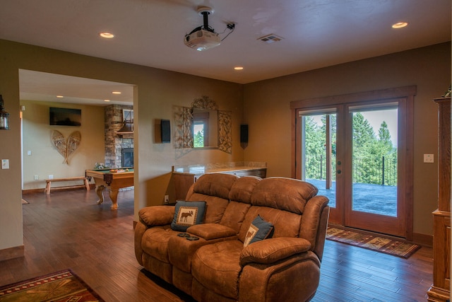 living room with billiards and dark hardwood / wood-style flooring