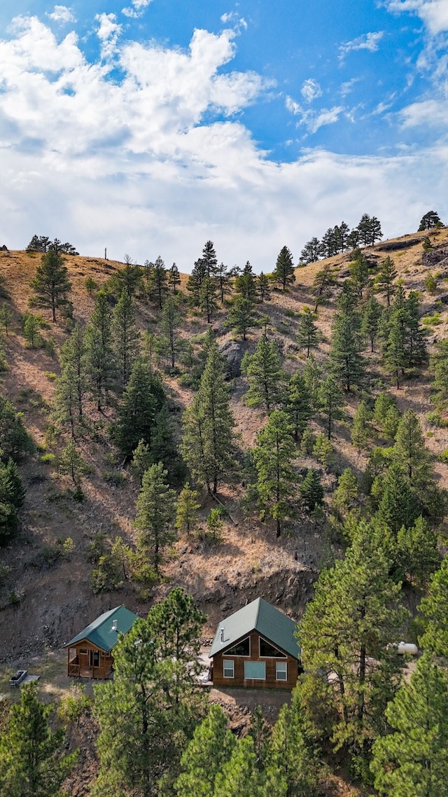 birds eye view of property featuring a rural view