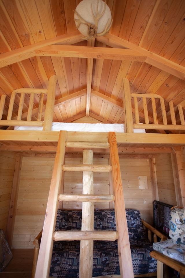 staircase with lofted ceiling with beams and wood ceiling