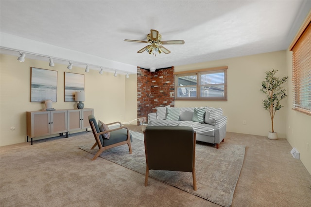 living room with light carpet and ceiling fan