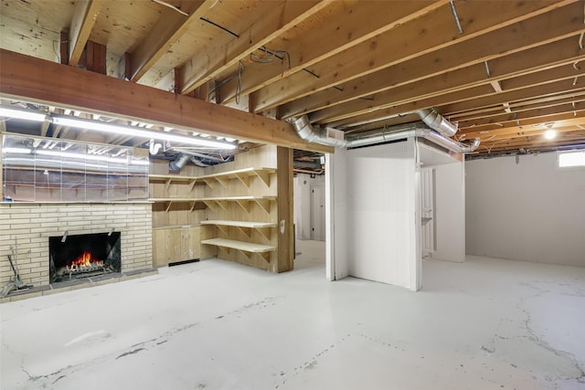 basement with a fireplace