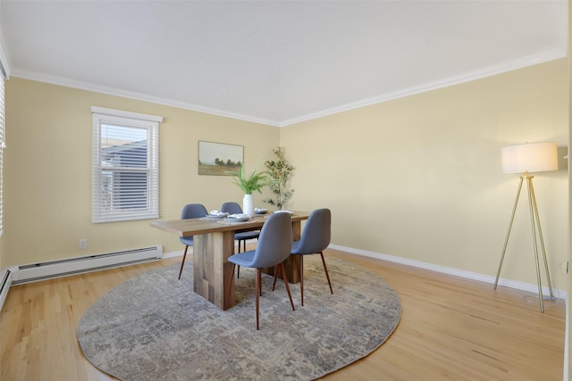 office featuring hardwood / wood-style flooring, ornamental molding, and baseboard heating