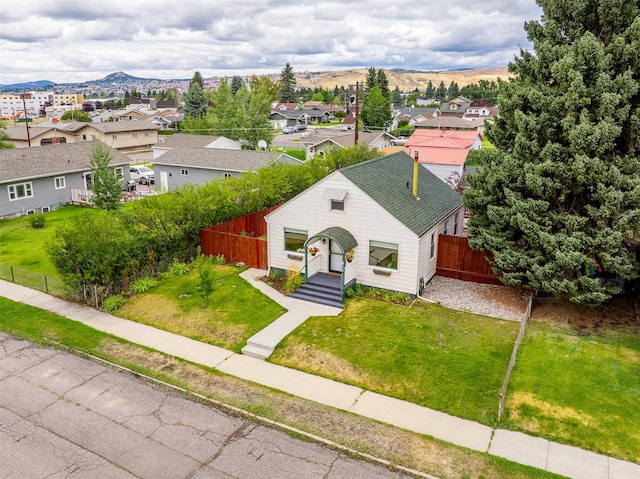 birds eye view of property featuring a mountain view