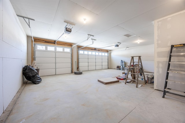 garage featuring a garage door opener