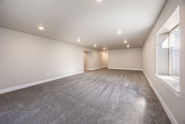 unfurnished room with carpet floors