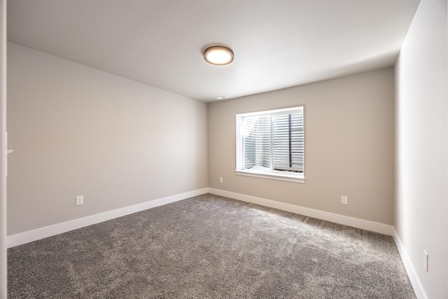 spare room featuring carpet flooring