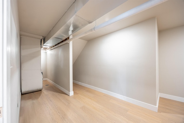 basement with light wood-type flooring