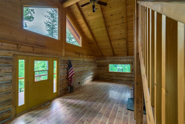 interior space with wood ceiling, ceiling fan, hardwood / wood-style flooring, and lofted ceiling with beams