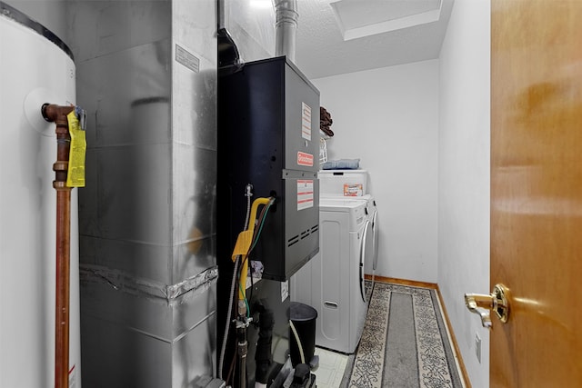 utility room with separate washer and dryer