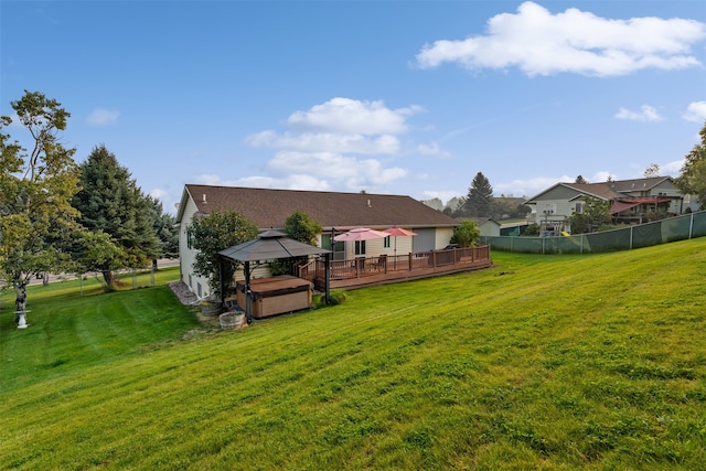 view of yard with a deck and a gazebo