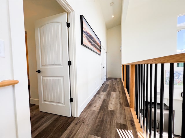 corridor with dark wood-type flooring