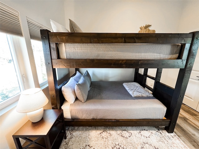 bedroom featuring wood-type flooring