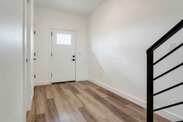 entryway with light wood-type flooring