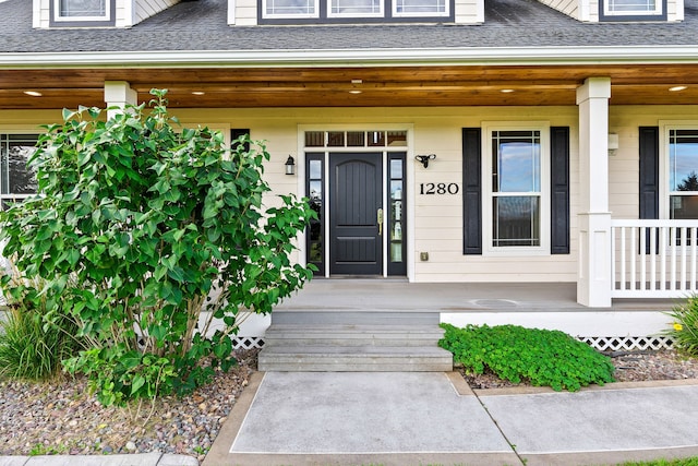 property entrance with covered porch