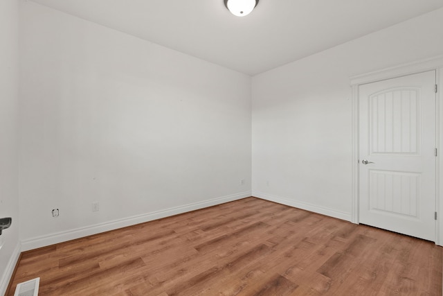 empty room with light wood-type flooring