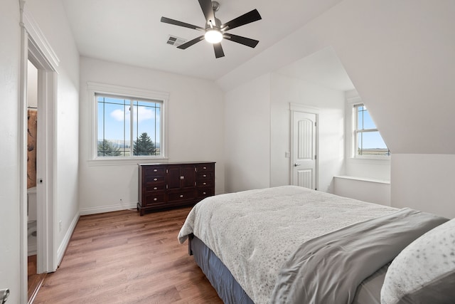 bedroom with ceiling fan and light hardwood / wood-style flooring