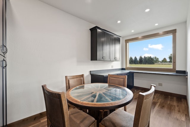 dining room featuring dark hardwood / wood-style flooring