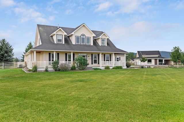 view of front of home with a front lawn and a porch