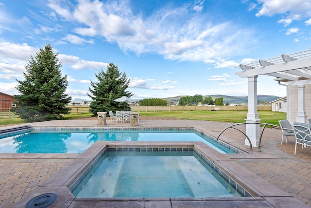 view of swimming pool featuring a mountain view, a patio, a pergola, and an in ground hot tub