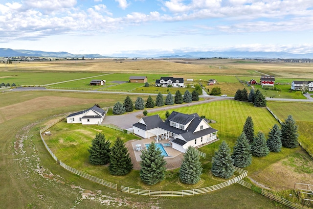 bird's eye view featuring a mountain view and a rural view