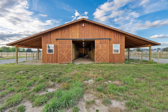 view of outbuilding with a rural view