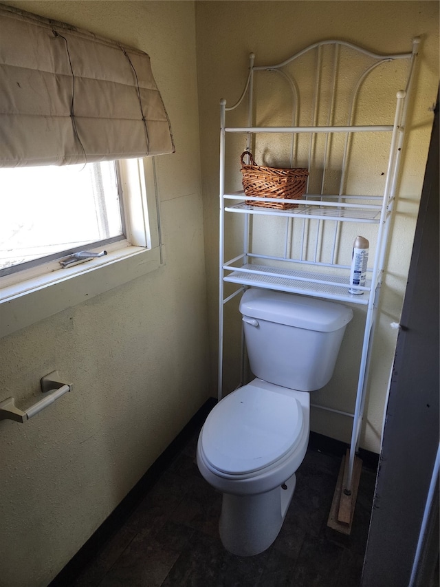 bathroom featuring toilet