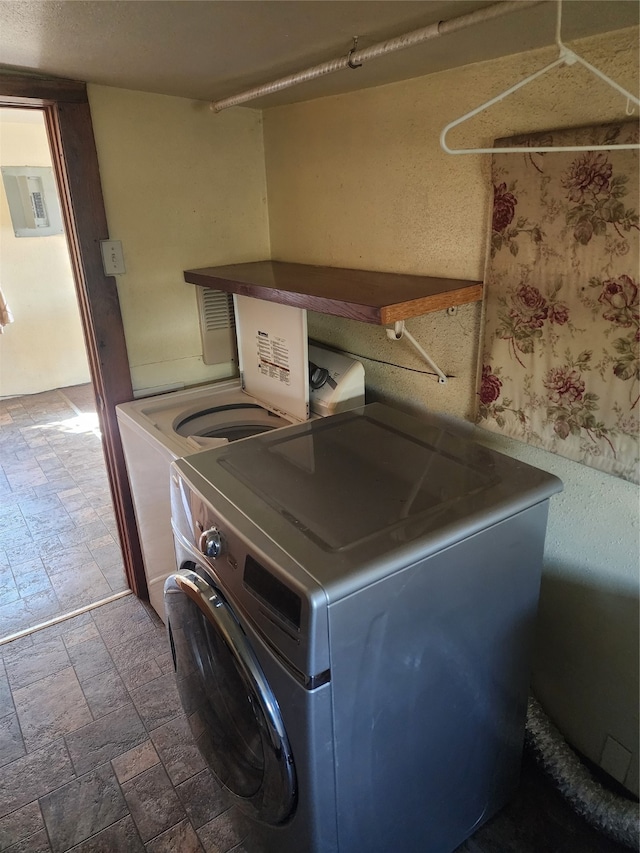 laundry area with washer and clothes dryer