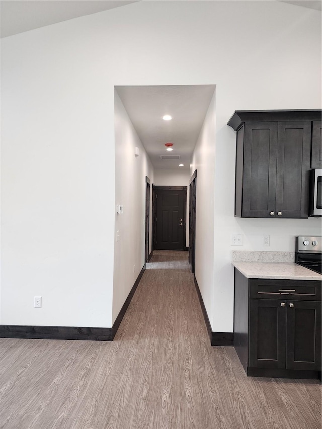 hallway featuring light hardwood / wood-style flooring