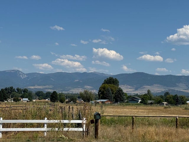 mountain view featuring a rural view