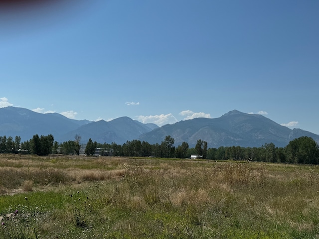 view of mountain feature with a rural view