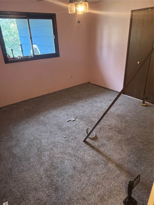 empty room featuring carpet flooring