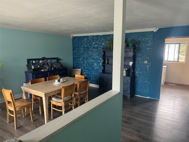 dining space featuring crown molding, dark hardwood / wood-style flooring, and a textured ceiling