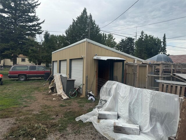 view of outbuilding featuring a garage