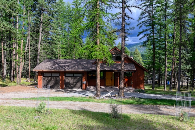 view of front of property featuring an outbuilding