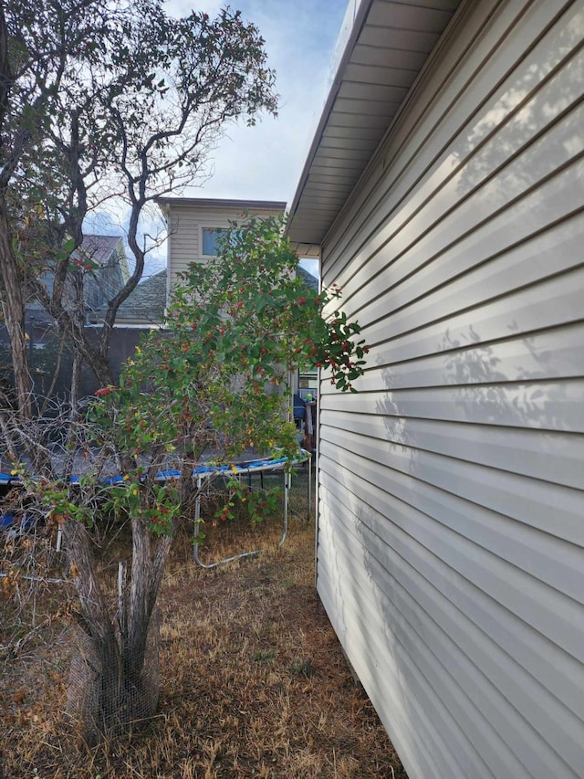 view of yard with a trampoline