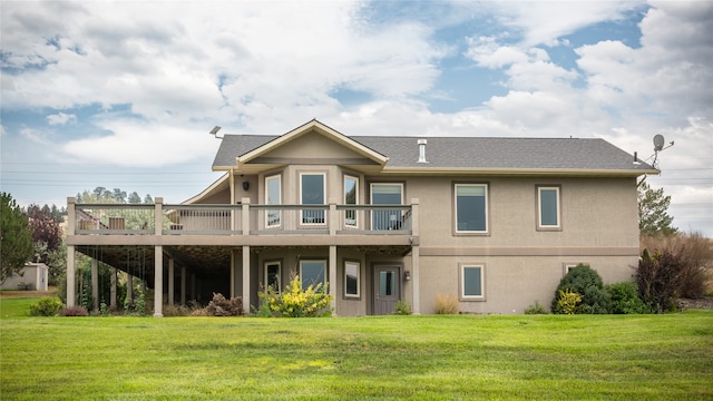 back of property with a lawn