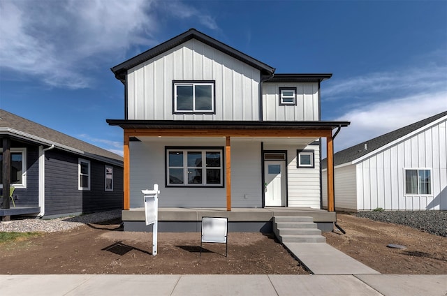 modern inspired farmhouse featuring a porch