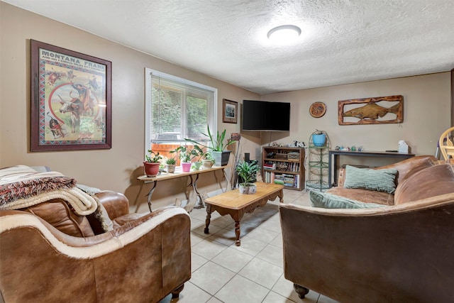 tiled living room with a textured ceiling