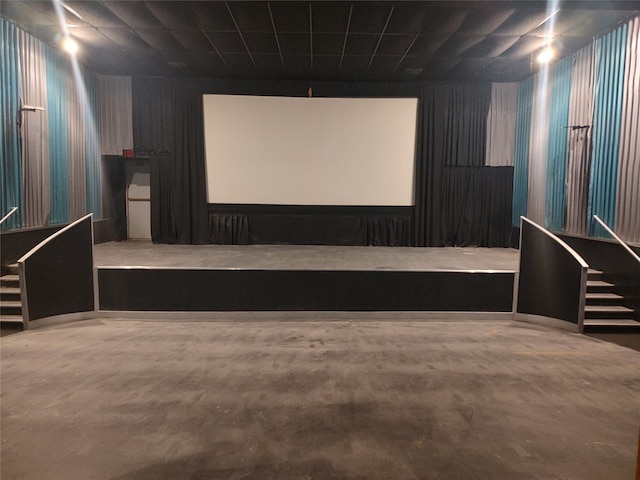 cinema featuring concrete flooring