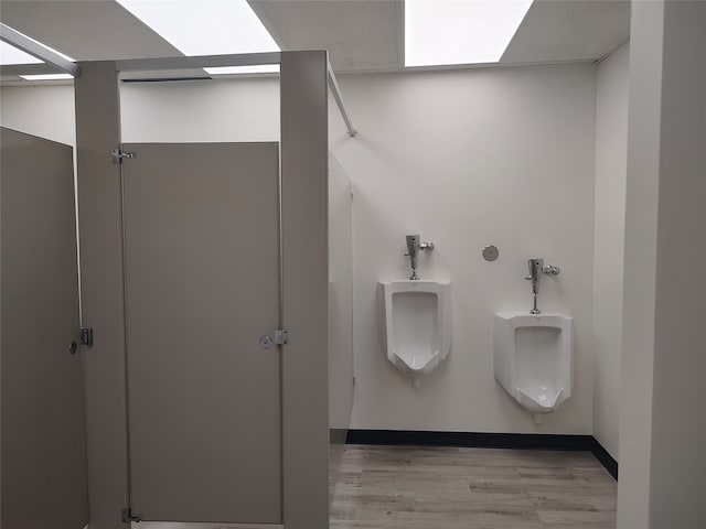 bathroom with hardwood / wood-style floors