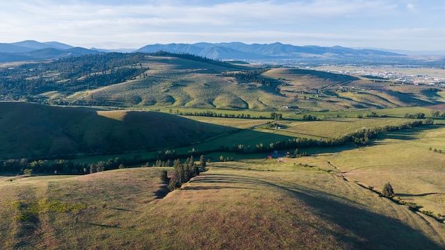 view of mountain feature with a rural view