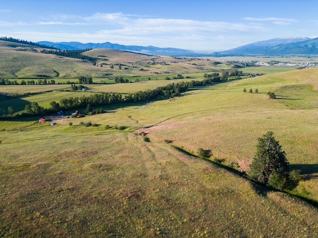 aerial view featuring a mountain view and a rural view