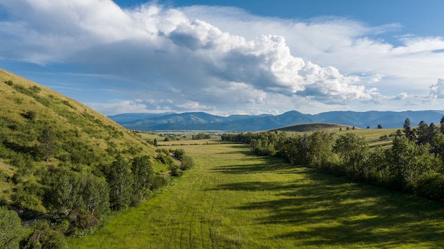 mountain view featuring a rural view