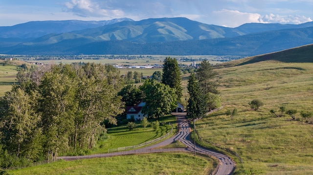 mountain view featuring a rural view