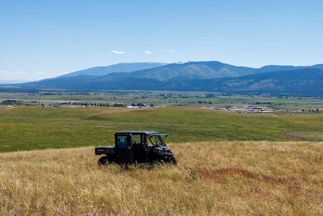 property view of mountains featuring a rural view