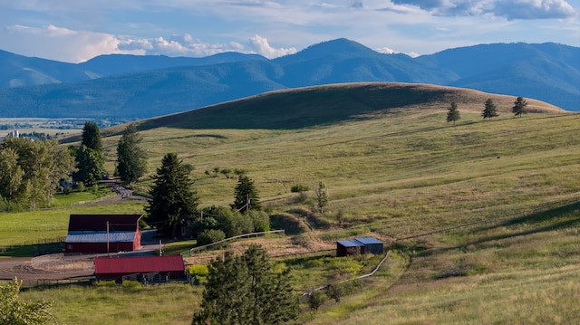 property view of mountains featuring a rural view