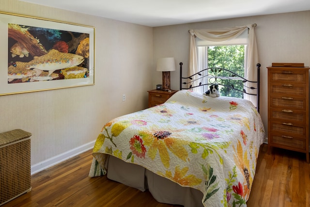 bedroom featuring dark hardwood / wood-style floors