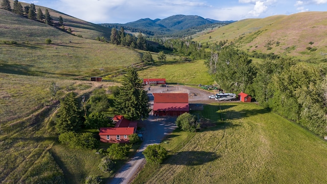 bird's eye view with a mountain view and a rural view