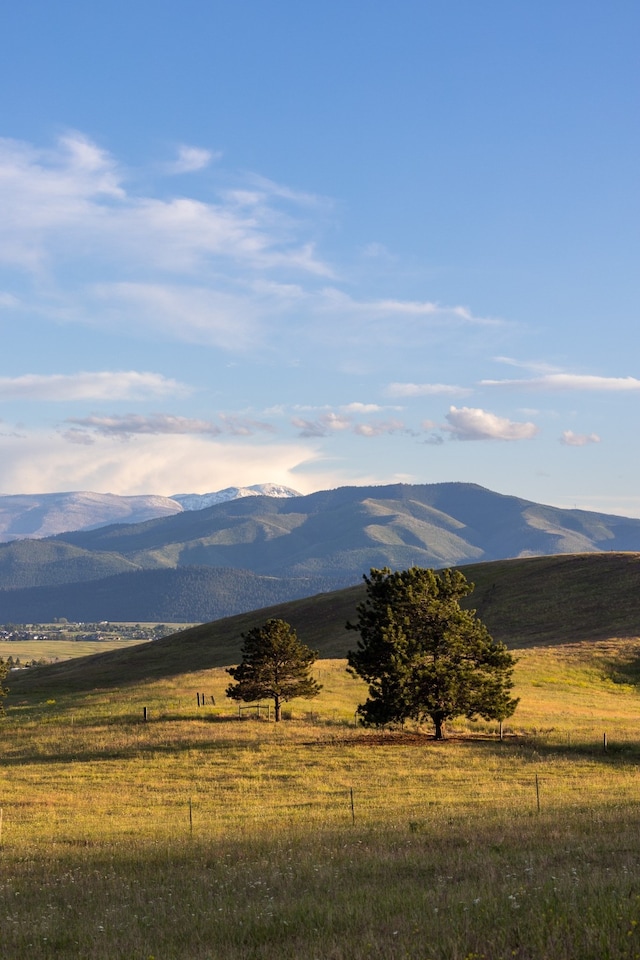 mountain view featuring a rural view