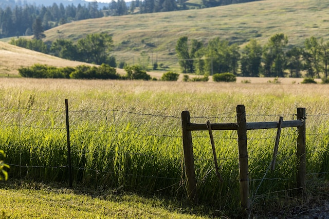 mountain view featuring a rural view